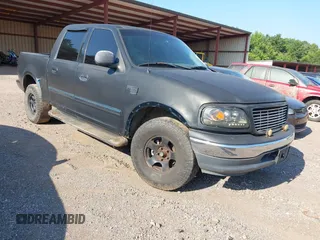 2001 Ford F-150 XLT z VIN 1FTRW07L41KB76786, wystawiony jako IAAI lot #42522649 z przebiegiem Nie podano mil oraz . Historia ofert i sprzedaży dostępna na DreamBid. Obrazek 1.