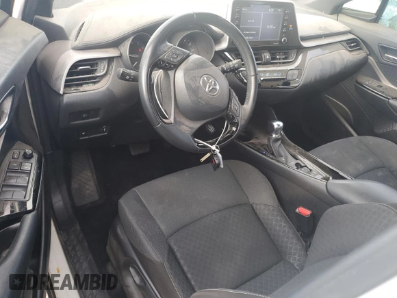 2021 Toyota C-HR LE with VIN JTNKHMBX3M1109664, listed as a Copart auction lot 87967165 with 84,688 mi miles and Salvage Title. Bid and sale history available at DreamBid. Image 8.