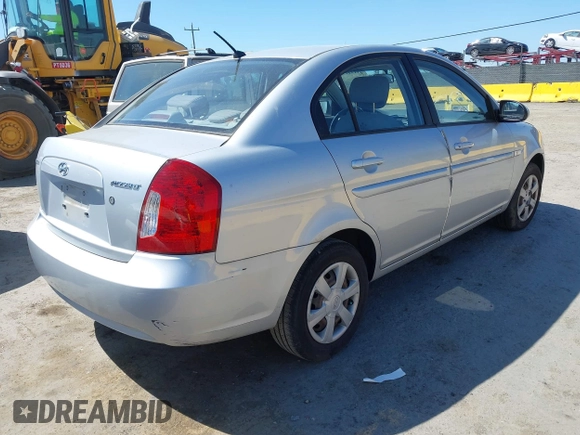 2007 Hyundai Accent GLS with VIN KMHCN46C57U087156, listed as a IAAI auction lot 42151298 with 81,588 mi miles. Bid and sale history available at carsss.com. Image 4.