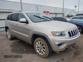 2014 Jeep Grand Cherokee Laredo with VIN 1C4RJEAG5EC424244, listed as a IAAI auction lot 41608821 with 156,251 mi miles and . Bid and sale history available at DreamBid. Image 1.