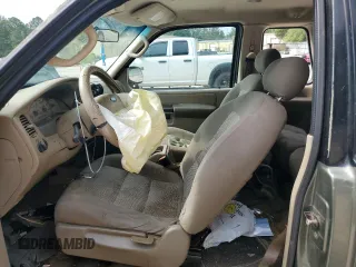 2003 Ford Explorer Sport XLS z VIN 1FMYU60E03UC12105, wystawiony jako Copart lot #67044604 z przebiegiem 277 642 mil mil oraz Szkody całkowita. Historia ofert i sprzedaży dostępna na DreamBid. Obrazek 7.
