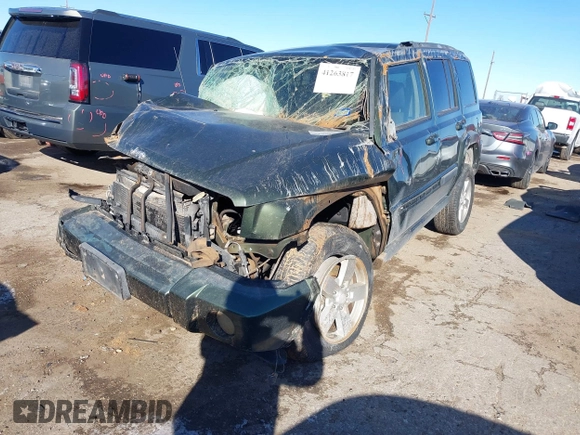2008 Jeep Commander Sport with VIN 1J8HH48K88C230817, listed as a IAAI auction lot 41263817 with 131,178 mi miles and . Bid and sale history available at DreamBid. Image 2.