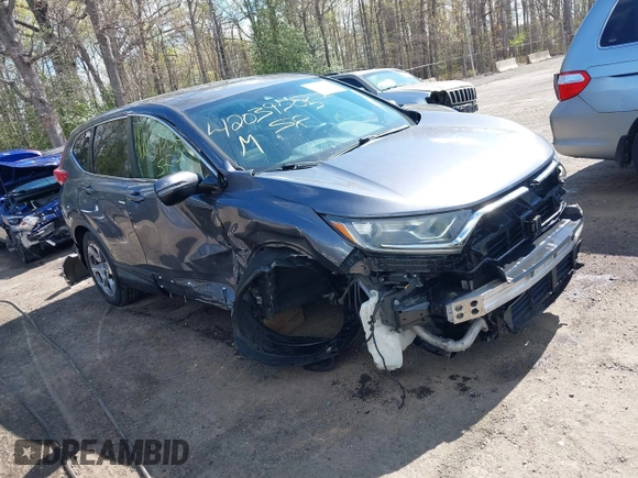 2017 Honda CR-V EX with VIN 2HKRW2H5XHH678674, listed as a IAAI auction lot 42039505 with 124,891 mi miles. Bid and sale history available at carsss.com. Image 1.