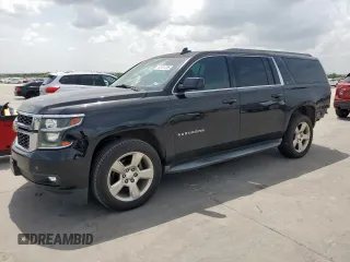 2015 Chevrolet Suburban LT with VIN 1GNSCJKC8FR708084, listed as a Copart auction lot 62411285 with 209,798 mi miles and Salvage title. Bid and sale history available at DreamBid. Image 1.