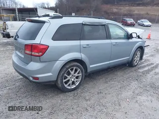 2013 Dodge Journey SXT with VIN 3C4PDDBG2DT579358, listed as a IAAI auction lot 41546005 with 167,489 mi miles and . Bid and sale history available at DreamBid. Image 4.