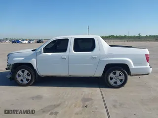 2010 Honda Ridgeline RTL with VIN 5FPYK1F54AB011339, listed as a IAAI auction lot 41983918 with 201,124 mi miles. Bid and sale history available at carsss.com. Image 14.