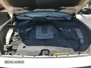 2015 Infiniti QX70 z VIN JN8CS1MW5FM481185, wystawiony jako Copart lot #52884555 z przebiegiem Nie podano mil oraz Szkoda całkowita • Salvage title. Historia ofert i sprzedaży dostępna na DreamBid. Obrazek 11.