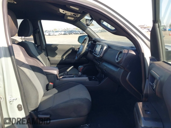 2022 Toyota Tacoma SR with VIN 3TMCZ5AN7NM501028, listed as a IAAI auction lot 42537868 with 42,186 mi miles and . Bid and sale history available at DreamBid. Image 5.