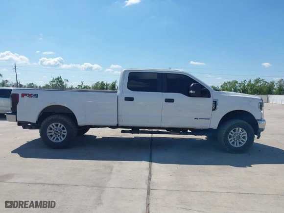 2019 Ford Super Duty F-250 SRW XL with VIN 1FT7W2BT9KEC89689, listed as a IAAI auction lot 40381550 with 214,406 mi miles. Bid and sale history available at carsss.com. Image 13.