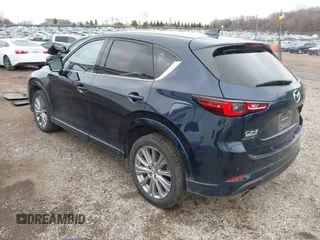 2023 Mazda CX-5 Signature with VIN JM3KFBXY5P0251046, listed as a IAAI auction lot 41505815 with 37,594 mi miles and . Bid and sale history available at carsss.com. Image 3.