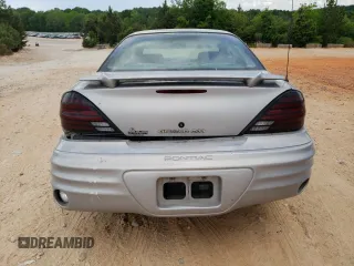 1999 Pontiac Grand Am z VIN 1G2NE12E3XM901263, wystawiony jako Copart lot #55723445 z przebiegiem 163 946 mil mil oraz Szkoda całkowita • Salvage title. Historia ofert i sprzedaży dostępna na DreamBid. Obrazek 6.