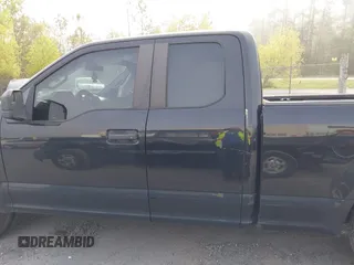 2015 Ford F-150 XL with VIN 1FTEX1CF2FKD12874, listed as a IAAI auction lot 41860610 with 242,215 mi miles. Bid and sale history available at carsss.com. Image 15.