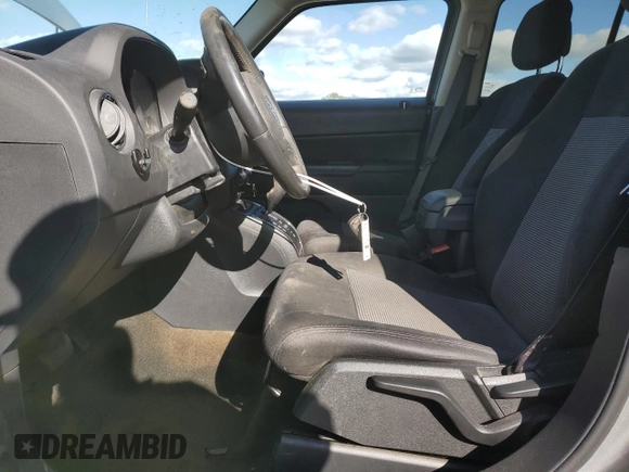 2016 Jeep Patriot High Altitude with VIN 1C4NJPFA3GD659205, listed as a Copart auction lot 51571065 with 99,170 mi miles and Salvage Title. Bid and sale history available at DreamBid. Image 7.