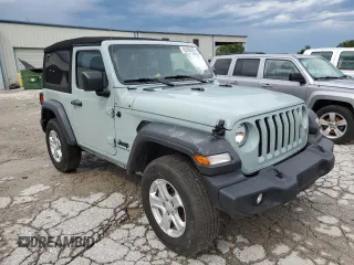 2023 Jeep Wrangler Sport with VIN 1C4HJXAG0PW595881, listed as a Copart auction lot 65590025 with 19,597 mi miles and Salvage title. Bid and sale history available at DreamBid. Image 4.