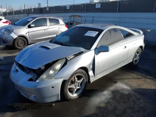 2000 Toyota Celica GTS with VIN JTDDY32T4Y0031461, listed as a IAAI auction lot 41405988 with 193,052 mi miles. Bid and sale history available at carsss.com. Image 2.