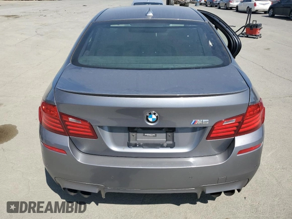 2014 BMW M5 z VIN WBSFV9C58ED593431, wystawiony jako Copart lot #54870555 z przebiegiem 172 191 mil mil oraz Szkoda całkowita • Salvage title. Historia ofert i sprzedaży dostępna na DreamBid. Obrazek 6.
