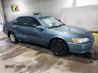 2000 Toyota Camry CE z VIN 4T1BG22K7YU744080, wystawiony jako Copart lot #56675105 z przebiegiem 226 154 mil mil oraz Szkoda całkowita • Salvage title. Historia ofert i sprzedaży dostępna na DreamBid. Obrazek 4.