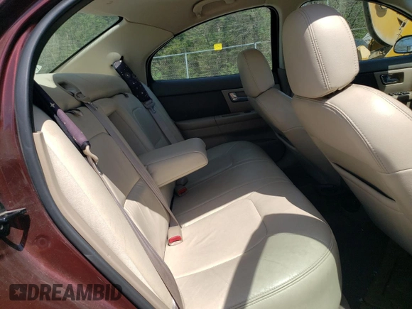 2000 Mercury Sable LS Premium z VIN 1MEFM55S9YA642372, wystawiony jako Copart lot #54555125 z przebiegiem 124 642 mil mil oraz Szkody całkowita. Historia ofert i sprzedaży dostępna na DreamBid. Obrazek 10.