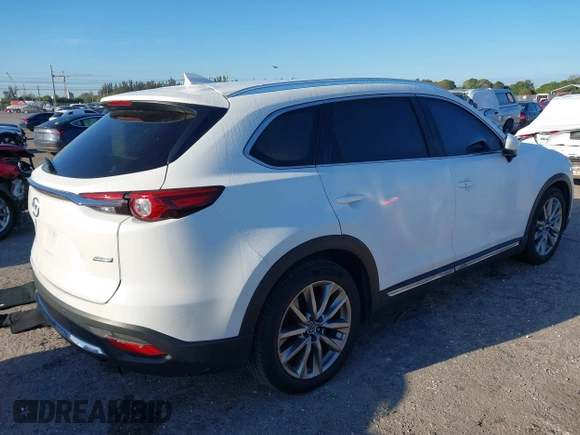 2019 Mazda CX-9 Grand Touring with VIN JM3TCADY3K0305173, listed as a IAAI auction lot 41672448 with 132,265 mi miles. Bid and sale history available at carsss.com. Image 4.