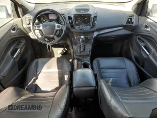 2014 Ford Escape Titanium z VIN 1FMCU0J9XEUD01904, wystawiony jako Copart lot #61819555 z przebiegiem 217 794 mil mil oraz Czysty tytuł • Clean title. Historia ofert i sprzedaży dostępna na DreamBid. Obrazek 8.