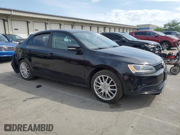 2012 Volkswagen Jetta SE with VIN 3VWDP7AJ2CM306614, listed as a Copart auction lot 58699615 with 164,234 mi miles and Salvage title. Bid and sale history available at DreamBid. Image 4.