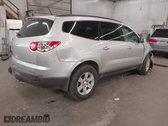2011 Chevrolet Traverse 1LT with VIN 1GNKVGEDXBJ290086, listed as a IAAI auction lot 41807384 with 85,173 mi miles and . Bid and sale history available at DreamBid. Image 4.