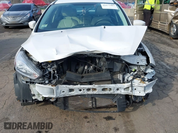2018 Ford Focus Titanium z VIN 1FADP3J25JL293835, wystawiony jako IAAI lot #41877487 z przebiegiem 109 211 mil mil oraz . Historia ofert i sprzedaży dostępna na DreamBid. Obrazek 6.