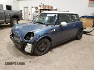 2010 MINI Hardtop with VIN WMWMF3C55ATZ67130, listed as a Copart auction lot 51225575 with 200,279 mi miles and Salvage Title. Bid and sale history available at DreamBid. Image 1.