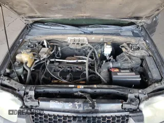 2006 Ford Escape XLS with VIN 1FMYU02ZX6KC49160, listed as a Copart auction lot 77269514 with 189,984 mi miles and Salvage Title. Bid and sale history available at carsss.com. Image 13.