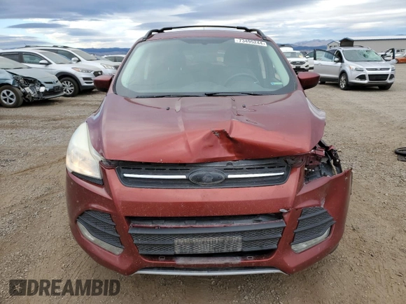 2015 Ford Escape SE with VIN 1FMCU9GX6FUC67715, listed as a Copart auction lot 73495244 with 184,183 mi miles and Salvage Title. Bid and sale history available at DreamBid. Image 5.