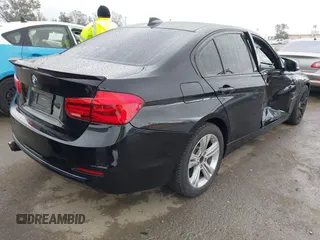 2016 BMW 3 Series 328i with VIN WBA8E9G52GNU28110, listed as a IAAI auction lot 41788797 with 96,910 mi miles. Bid and sale history available at carsss.com. Image 4.