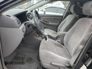 2006 Toyota Corolla CE with VIN JTDBR32E260096828, listed as a Copart auction lot 54001655 with 207,003 mi miles and Salvage Title. Bid and sale history available at DreamBid. Image 7.