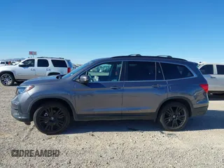 2022 Honda Pilot Special Edition with VIN 5FNYF5H27NB013972, listed as a IAAI auction lot 41219766 with 52,291 mi miles and . Bid and sale history available at carsss.com. Image 14.