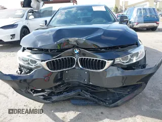 2015 BMW 4 Series 428i z VIN WBA4A9C5XFD416873, wystawiony jako IAAI lot #42108645 z przebiegiem 93 433 mil mil oraz . Historia ofert i sprzedaży dostępna na DreamBid. Obrazek 6.