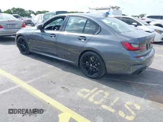 2022 BMW 3 Series 330i with VIN 3MW5R1J0XN8C41168, listed as a IAAI auction lot 42322526 with 44,889 mi miles and . Bid and sale history available at DreamBid. Image 3.