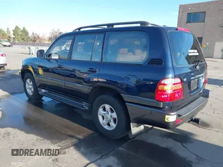 2000 Toyota Land Cruiser with VIN JT3HT05J3Y0098534, listed as a IAAI auction lot 41054858 with 336,520 mi miles. Bid and sale history available at carsss.com. Image 3.