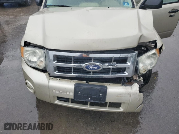 2012 Ford Escape XLT z VIN 1FMCU9DG1CKC74602, wystawiony jako Copart lot #57764325 z przebiegiem 153 872 mil mil oraz Szkoda całkowita • Salvage title. Historia ofert i sprzedaży dostępna na DreamBid. Obrazek 12.