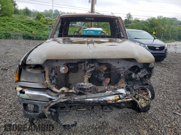 2005 Ford Ranger XL z VIN 1FTZR15E55PA85262, wystawiony jako Copart lot #57637155 z przebiegiem Nie podano mil oraz Szkoda całkowita • Salvage title. Historia ofert i sprzedaży dostępna na DreamBid. Obrazek 5.