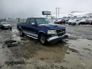 1997 Ford F-150 XL with VIN 1FTEX17LXVKB44786, listed as a Copart auction lot 49630955 with 301,736 mi miles and Salvage title. Bid and sale history available at DreamBid. Image 10.