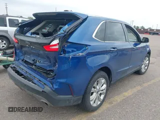 2022 Ford Edge Titanium with VIN 2FMPK4K95NBB05789, listed as a IAAI auction lot 42582372 with 58,379 mi miles and . Bid and sale history available at DreamBid. Image 4.