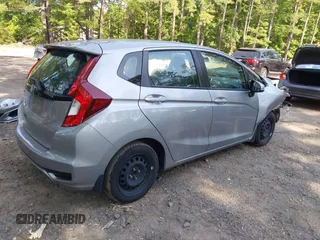 2020 Honda Fit LX z VIN 3HGGK5H47LM717334, wystawiony jako IAAI lot #42574053 z przebiegiem 81 279 mil mil oraz . Historia ofert i sprzedaży dostępna na DreamBid. Obrazek 4.