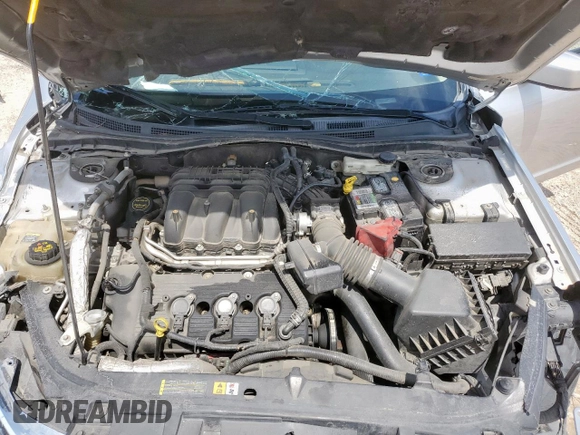 2012 Ford Fusion SE z VIN 3FAHP0HG8CR145183, wystawiony jako Copart lot #58627705 z przebiegiem 236 148 mil mil oraz Szkoda całkowita • Salvage title. Historia ofert i sprzedaży dostępna na DreamBid. Obrazek 11.