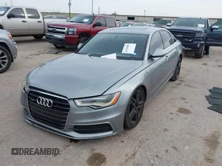 2015 Audi A6 3.0T Premium Plus with VIN WAUFGAFC9FN047047, listed as a IAAI auction lot 41328488 with 83,840 mi miles. Bid and sale history available at carsss.com. Image 2.