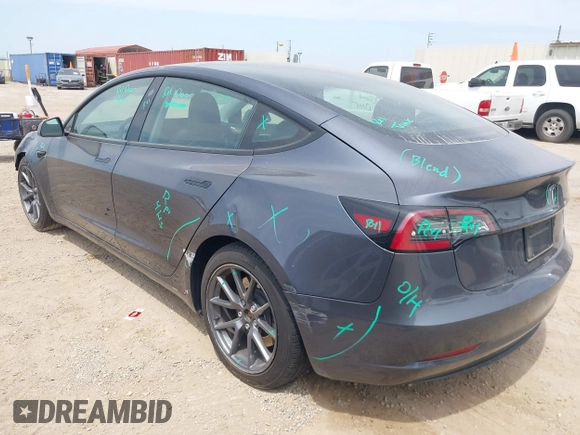 2023 Tesla Model 3 with VIN 5YJ3E1EA5PF565071, listed as a IAAI auction lot 42232719 with 15,389 mi miles and . Bid and sale history available at DreamBid. Image 3.