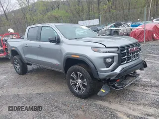 2024 GMC Canyon 4WD AT4 with VIN 1GTP6DEKXR1143138, listed as a IAAI auction lot 41952154 with 26,062 mi miles. Bid and sale history available at carsss.com. Image 1.