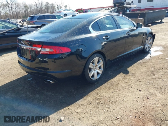 2011 Jaguar XF with VIN SAJWA0FB7BLS01476, listed as a IAAI auction lot 41662462 with 128,048 mi miles. Bid and sale history available at carsss.com. Image 4.
