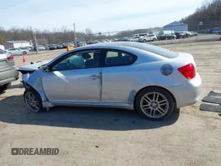 2005 Scion tC with VIN JTKDE177050043393, listed as a IAAI auction lot 41762368 with 170,244 mi miles. Bid and sale history available at carsss.com. Image 14.