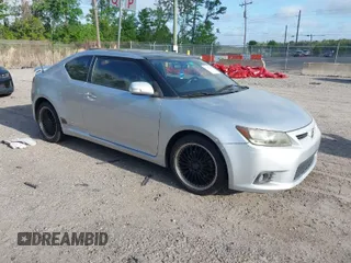 2012 Scion tC with VIN JTKJF5C72C3037233, listed as a IAAI auction lot 41972620 with 229,001 mi miles. Bid and sale history available at carsss.com. Image 1.