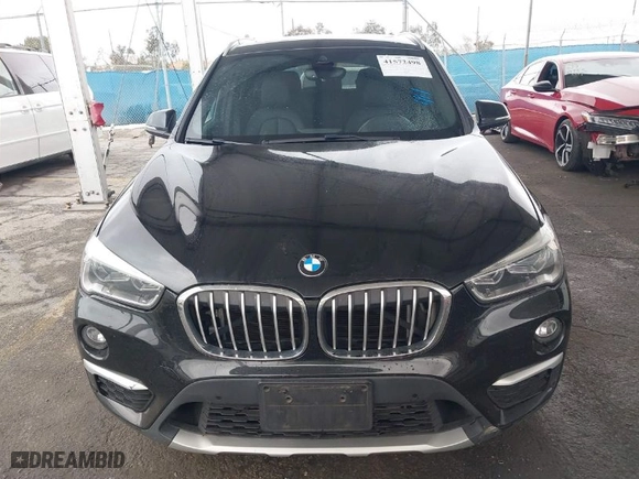 2019 BMW X1 sDrive28i with VIN WBXHU7C54K3H45266, listed as a IAAI auction lot 41572498 with 81,303 mi miles. Bid and sale history available at carsss.com. Image 12.