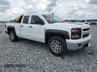 2015 Chevrolet Silverado 1500 LT with VIN 1GCVKREC4FZ254998, listed as a Copart auction lot 55126235 with 213,911 mi miles and Salvage Title. Bid and sale history available at DreamBid. Image 4.